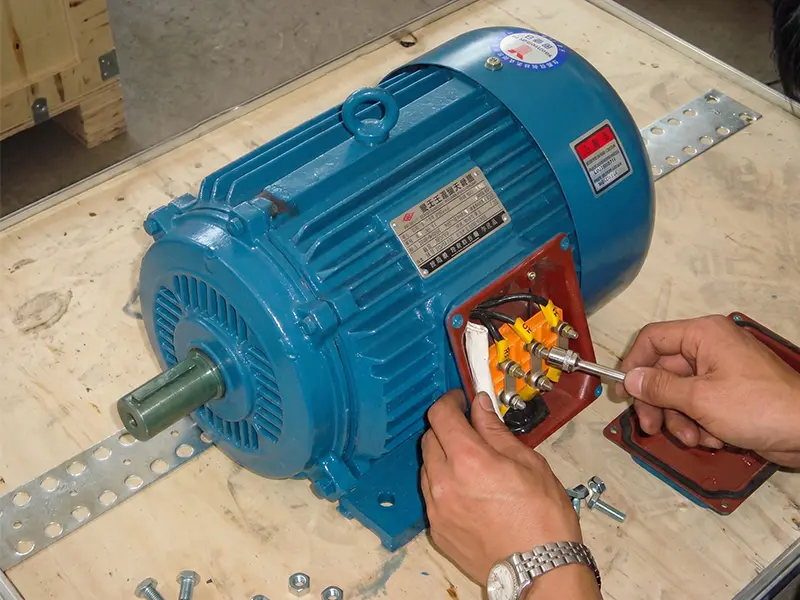 Pure copper wire coil motor closeup inside mini electric fodder cutter