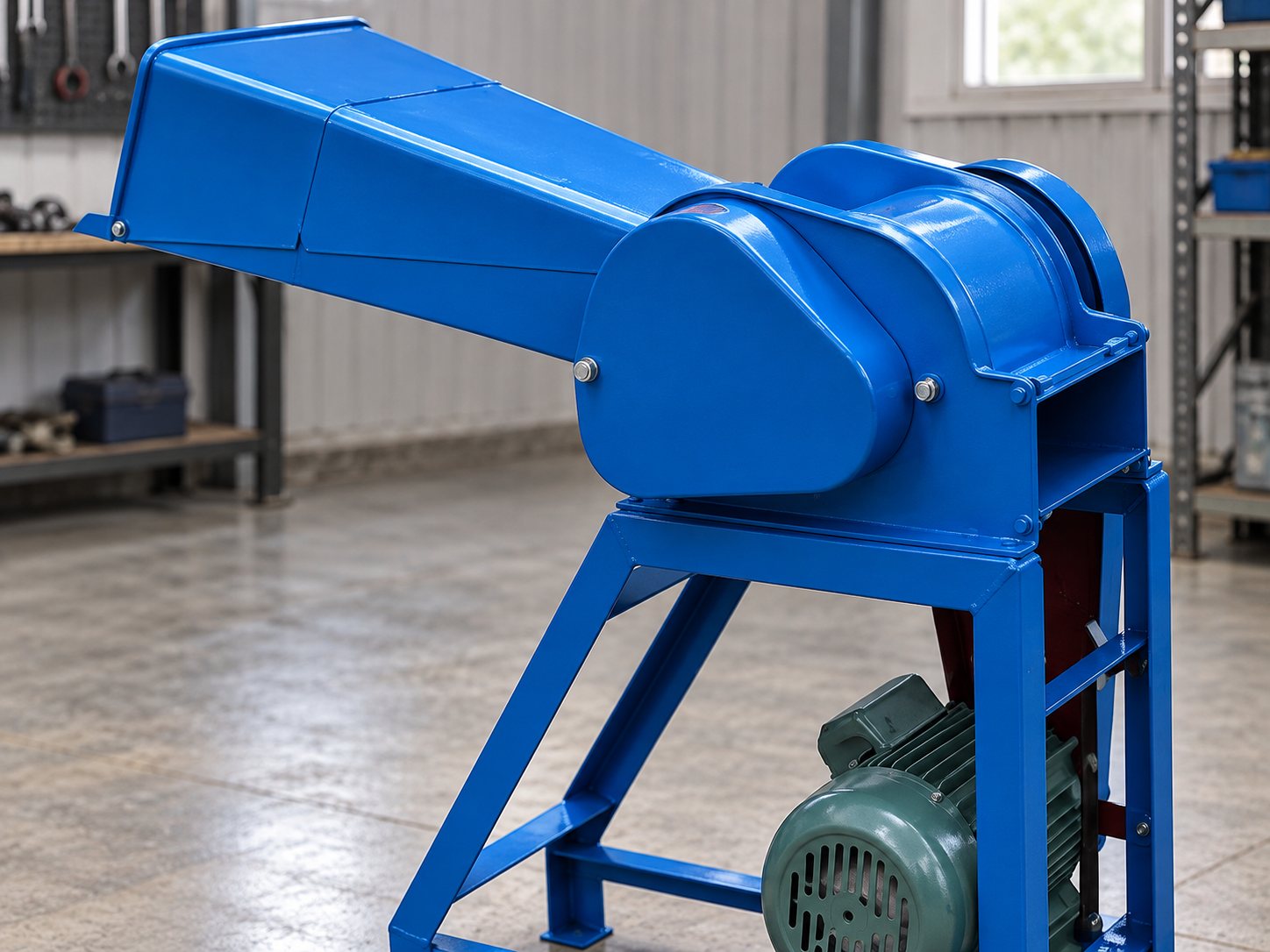 Compact blue cutting machine with an enclosed feed chute