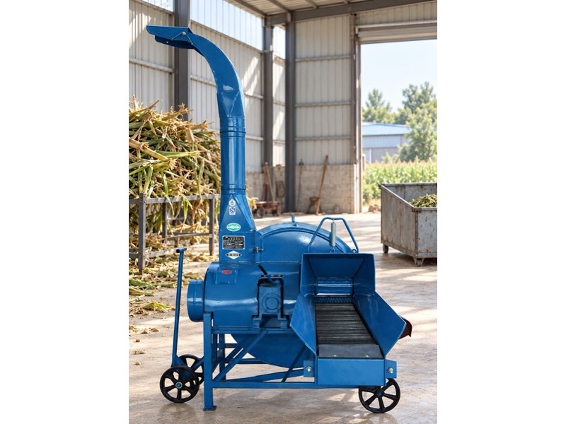 Blue Chaff Cutter Machine with feed conveyor and curved discharge spout, based on supplied product photography
