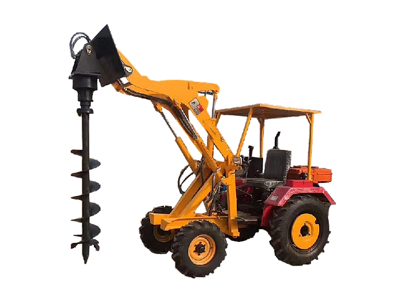 Mini loader with hydraulic earth auger drill attachment