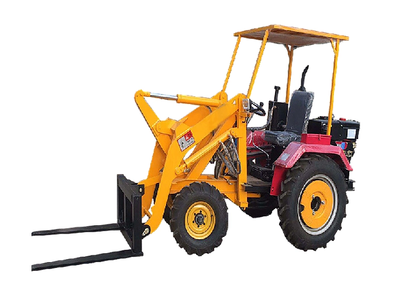 Compact loader with pallet fork attachment for lifting bagged feed